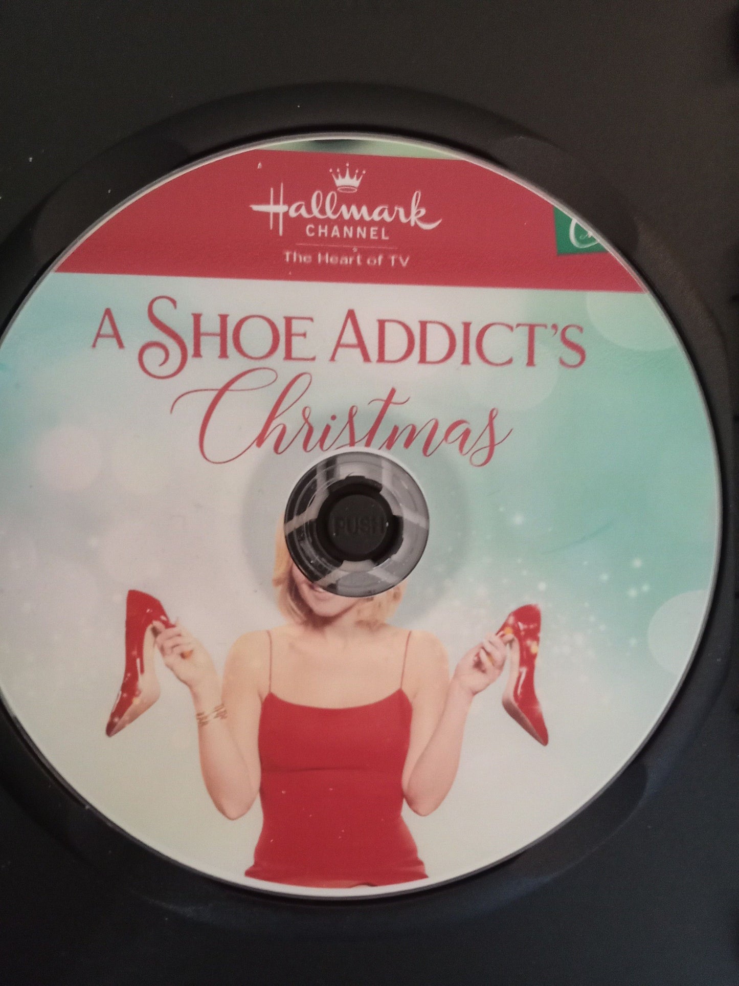 A Shoe Addicts Christmas (2018) with CCB (Candace Cameron Bure) in a DVD case with cover art